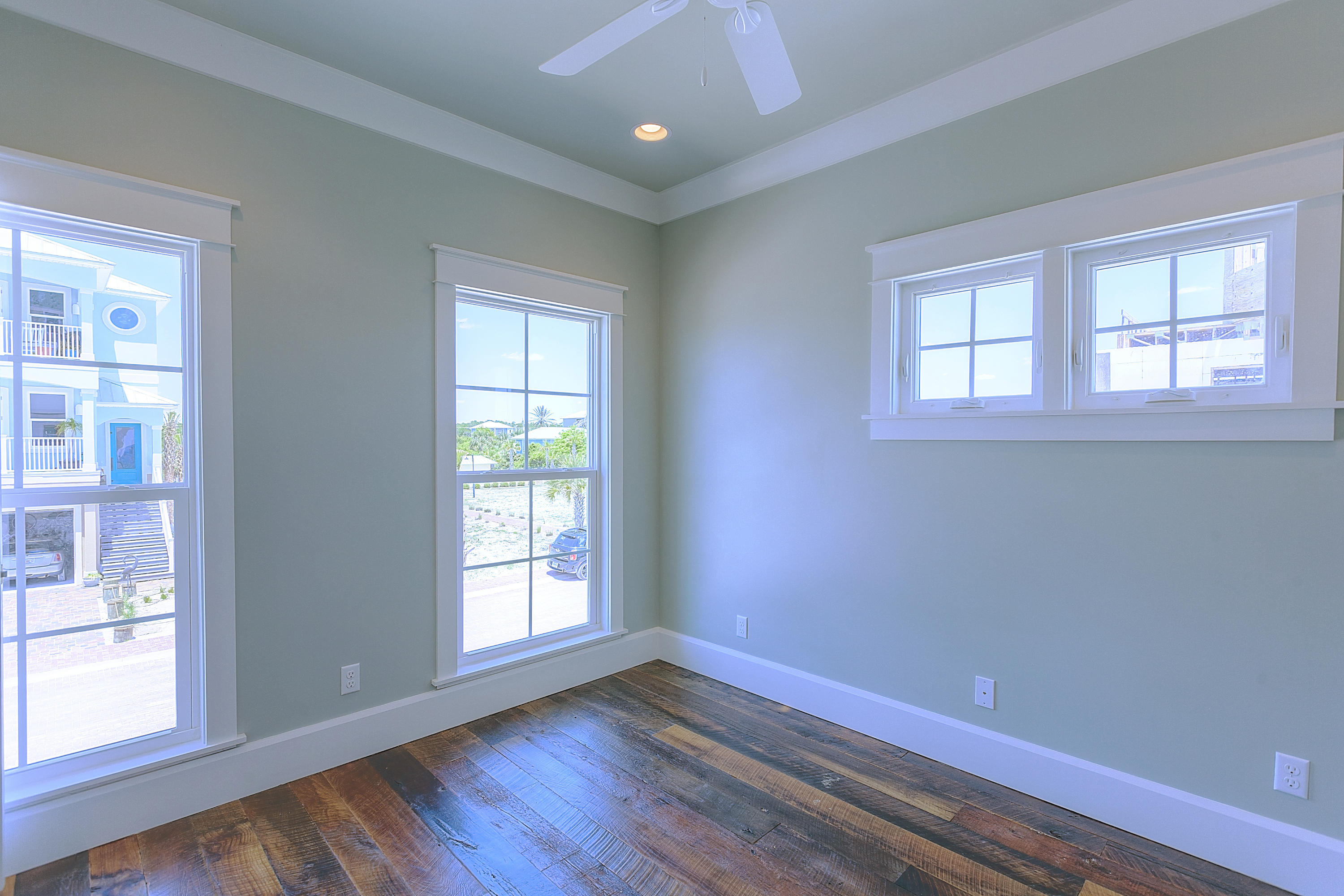 94 Emerald Cove Inlet Beach Inlet Beach, FL 32461 - Photo 10 of 21 a view of an empty room with wooden floor and a window
