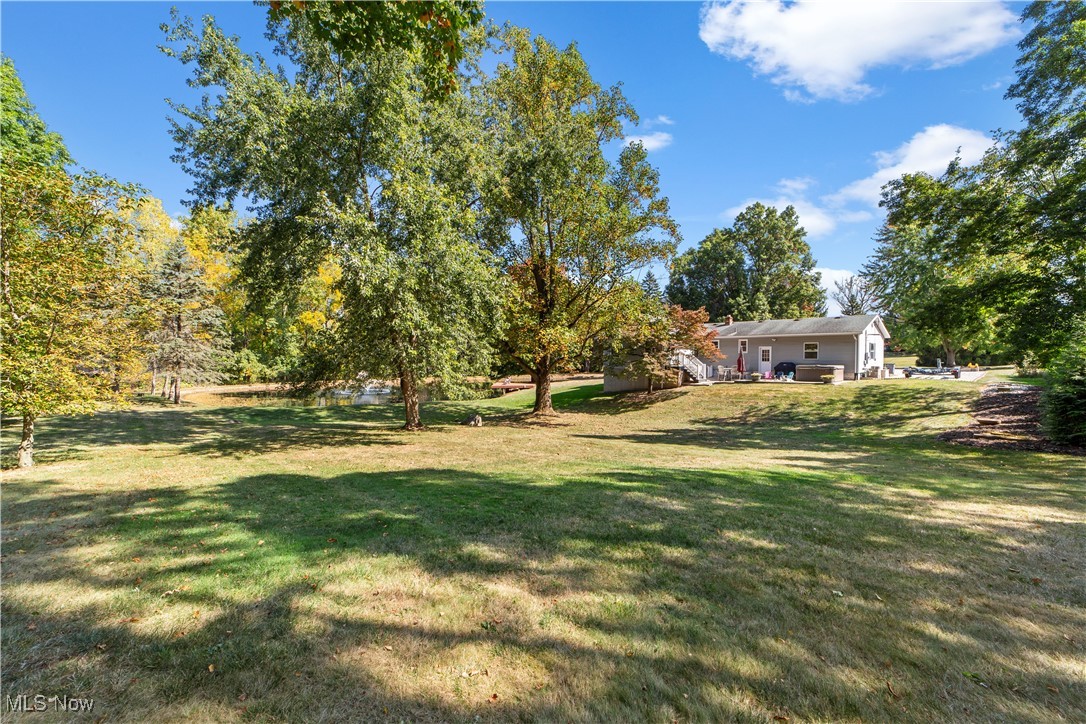 3694 Nichols Road Medina, OH 44256 - Photo 35 of 47 View of green lawn featuring a patio