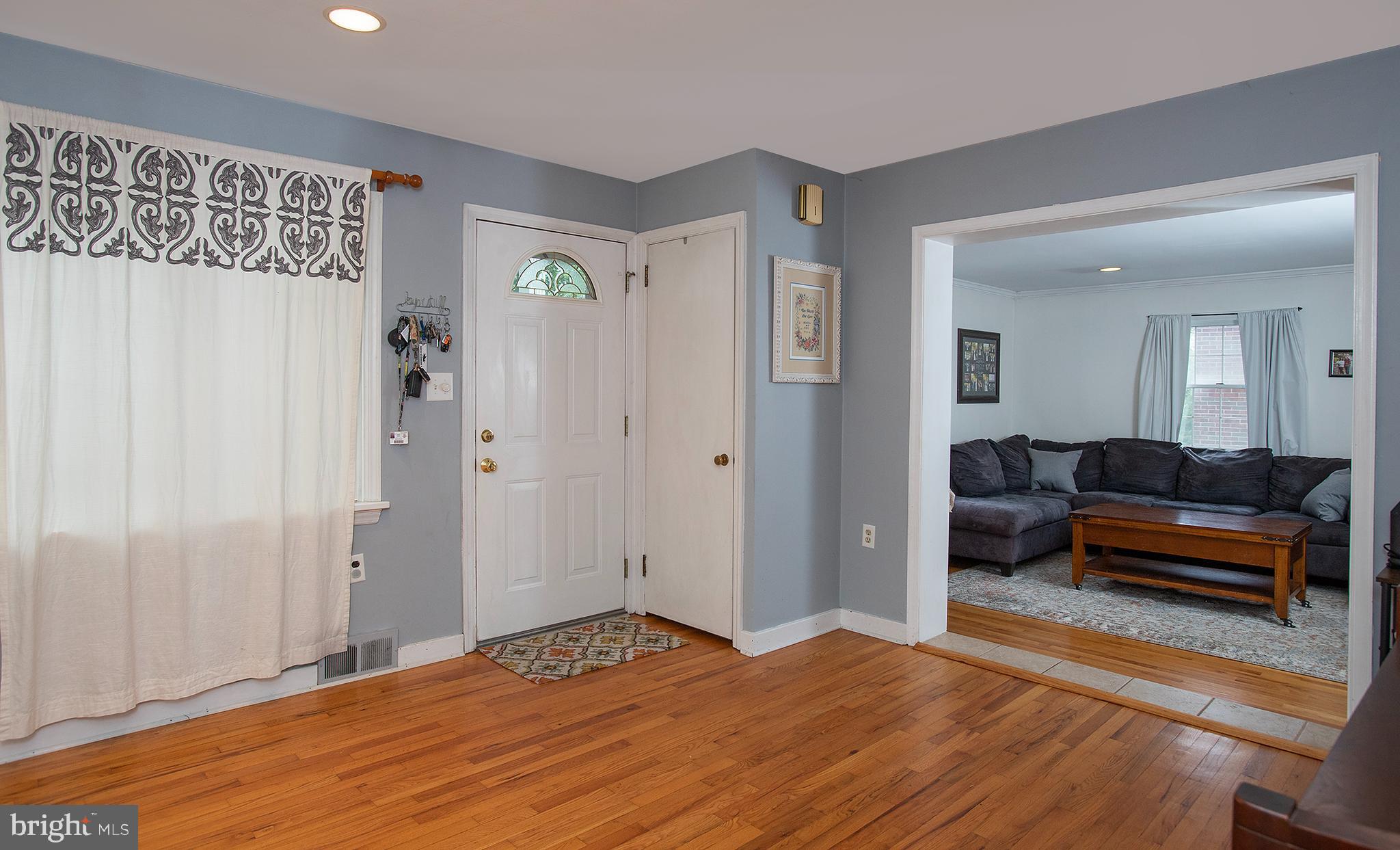 Living Room with coat closet.