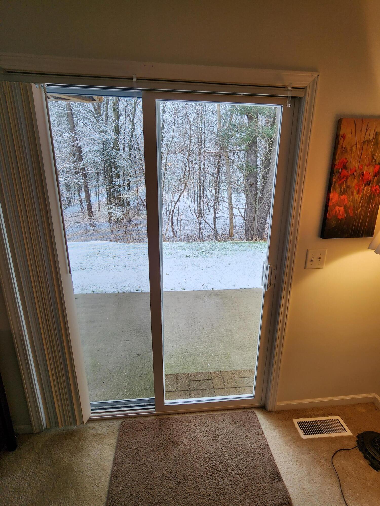 1295 North Whitehall Road, Unit 23 Muskegon, MI 49445 - Photo 12 of 35 Slider to Patio