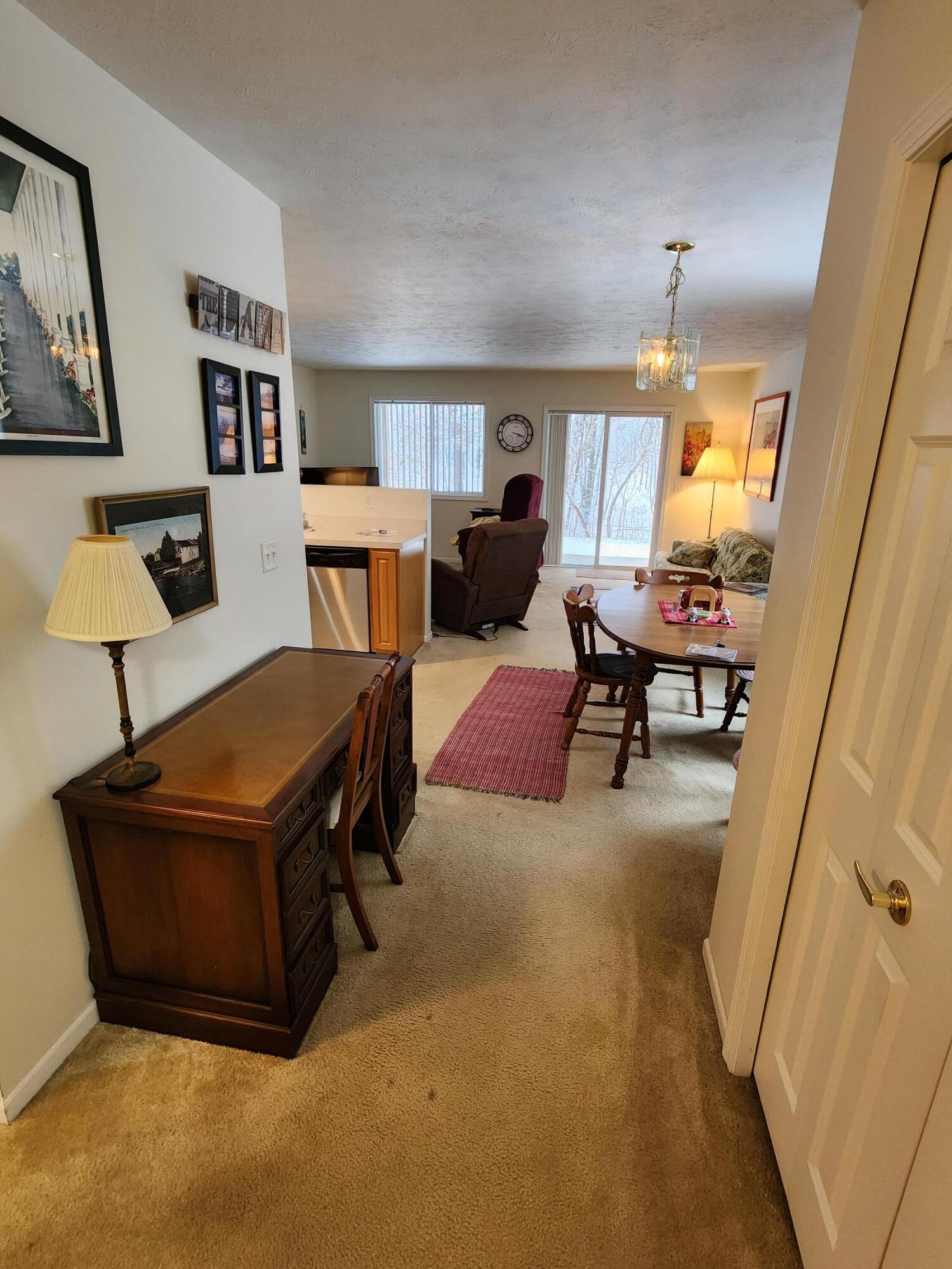 1295 North Whitehall Road, Unit 23 Muskegon, MI 49445 - Photo 5 of 35 Hallway Leading to Living Area