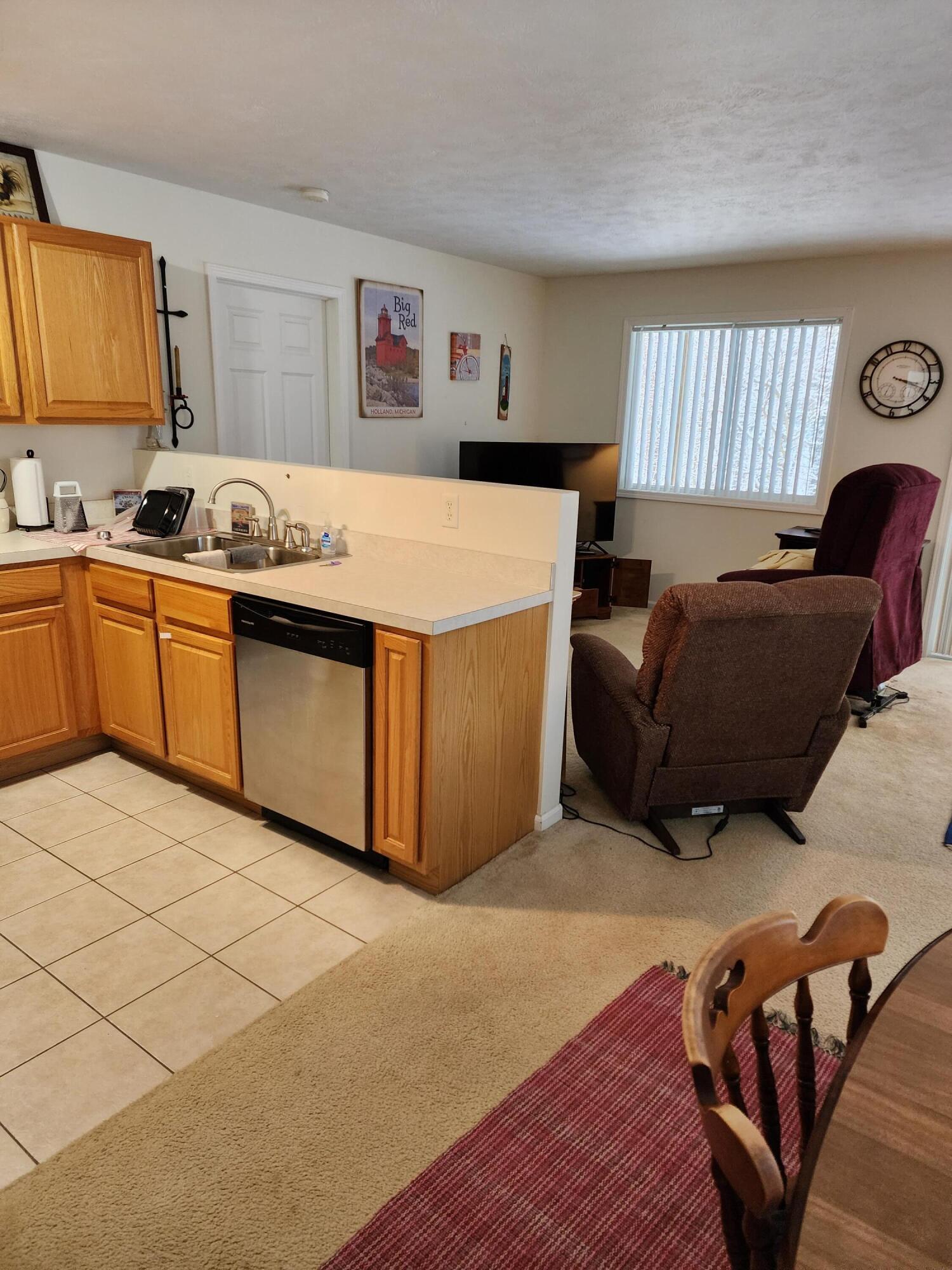 1295 North Whitehall Road, Unit 23 Muskegon, MI 49445 - Photo 7 of 35 Kitchen and Living Area