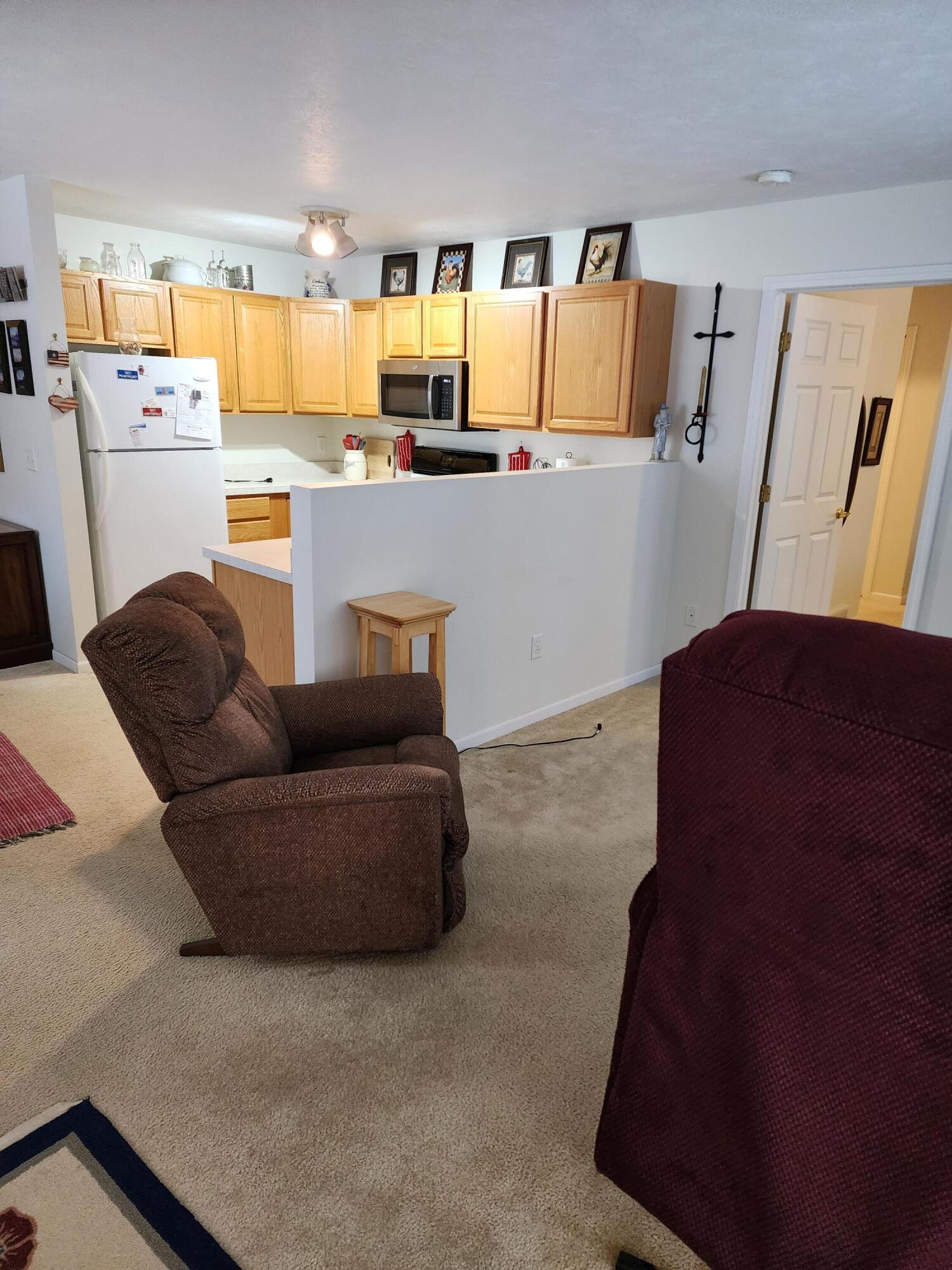 1295 North Whitehall Road, Unit 23 Muskegon, MI 49445 - Photo 8 of 35 Living Area & Kitchen