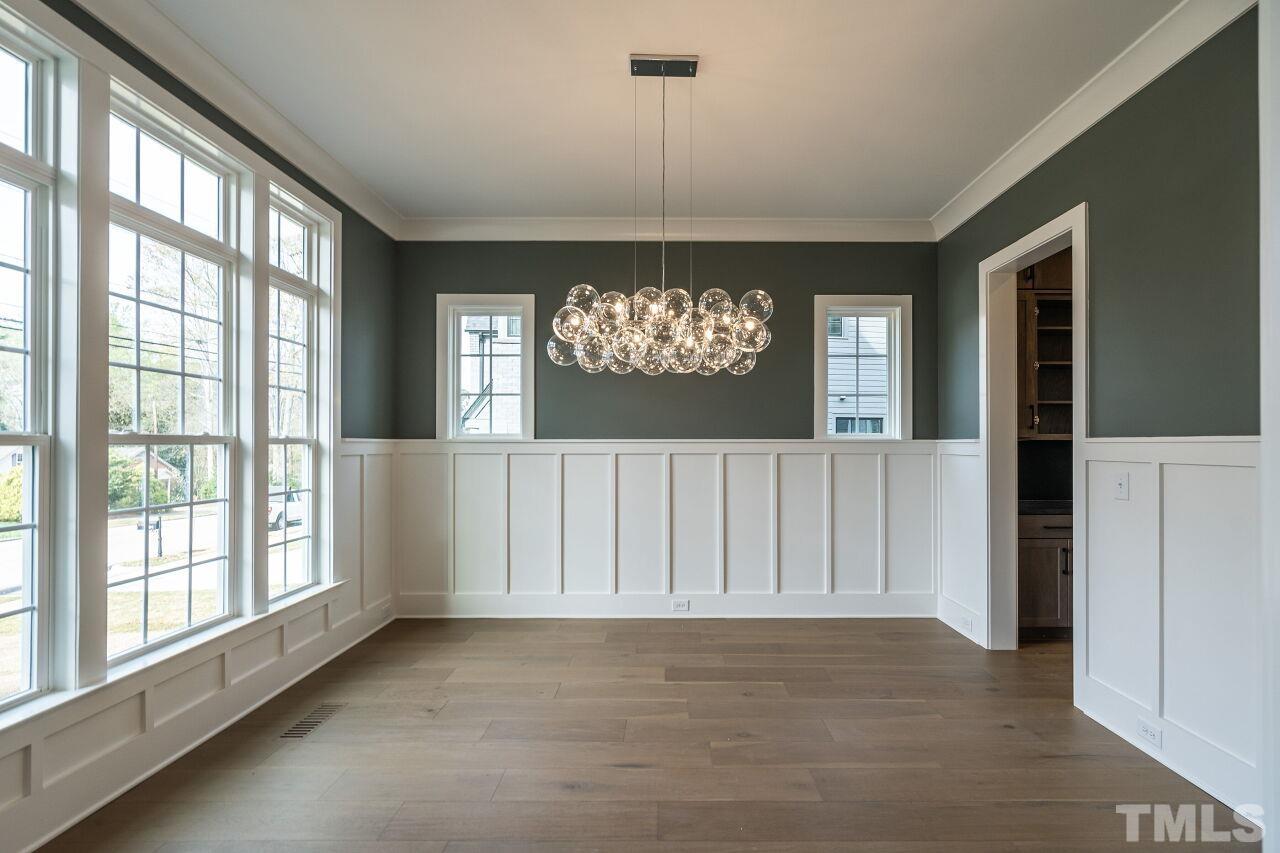 1100 Shelley Road Raleigh, NC 27609 - Photo 7 of 41 a view of livingroom with windows