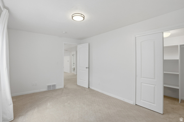 2007 Fielding Hill Lane Draper, UT 84020 - Photo 40 of 83 Neutral tone carpeting complements the white walls and trim