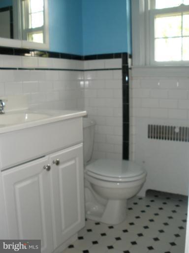 321 Dunkirk Road Baltimore, MD 21212 - Photo 16 of 30 a white toilet sitting next to a window