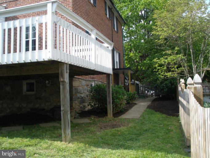 321 Dunkirk Road Baltimore, MD 21212 - Photo 29 of 30 a view of a house with a yard and deck