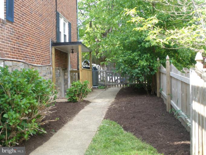 321 Dunkirk Road Baltimore, MD 21212 - Photo 10 of 30 a view of a pathway with a house