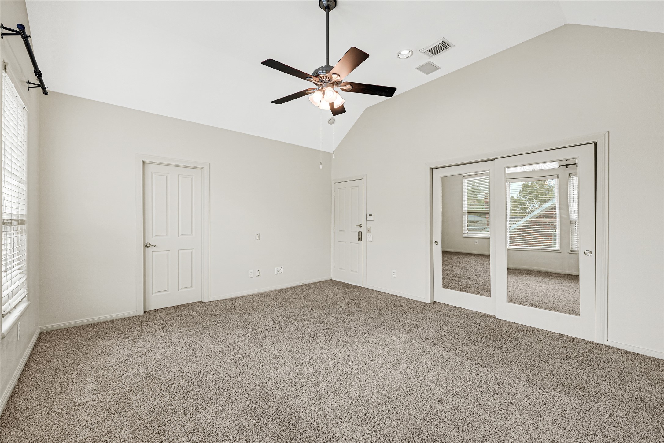 2414 Calumet Street, Unit B Houston, TX 77004 - Photo 17 of 27 a view of room with window and ceiling fan