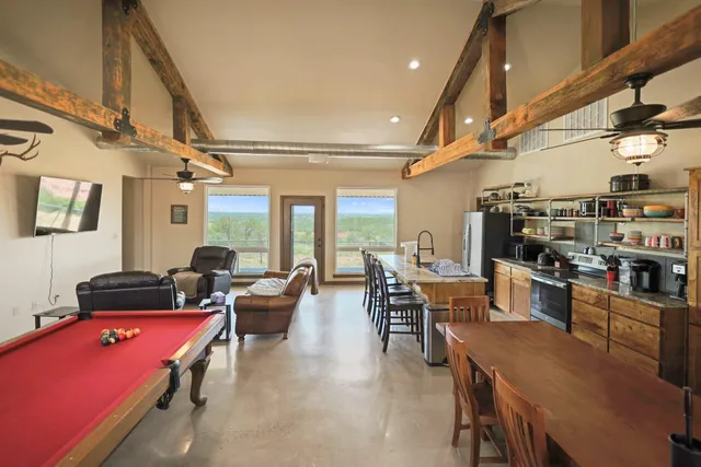 a outdoor space with lots of furniture and garden view