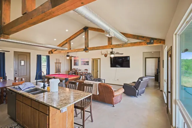 a bedroom with bed and tv