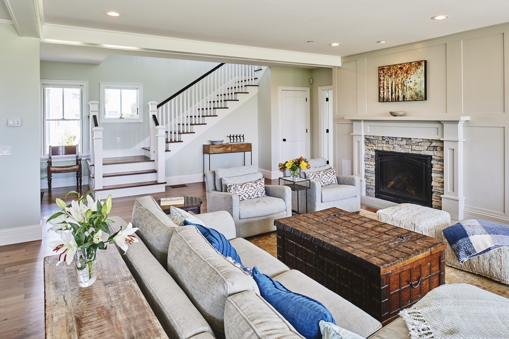 3 A Johnnies Way Rehoboth, MA 02769 - Photo 3 of 9 a living room with furniture and a fireplace