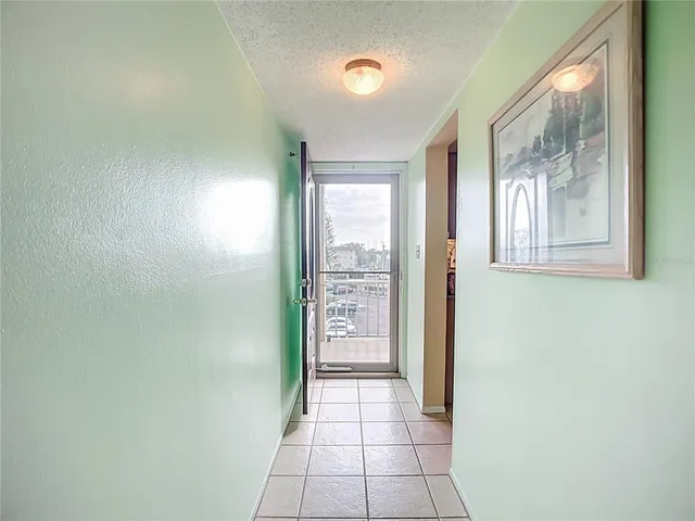 a view of hallway with windows