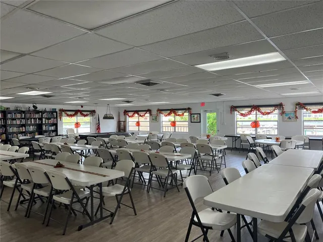 a view of balcony with outdoor space and lake view