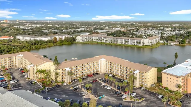 aerial view of a building with lake view