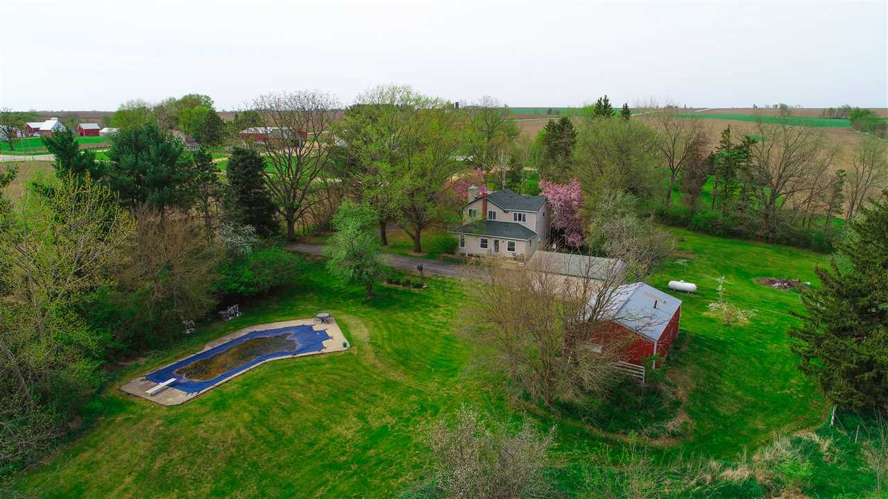 14903 West Eagle Point Road Polo, IL 61064 - Photo 1 of 25 an aerial view of a house with a yard