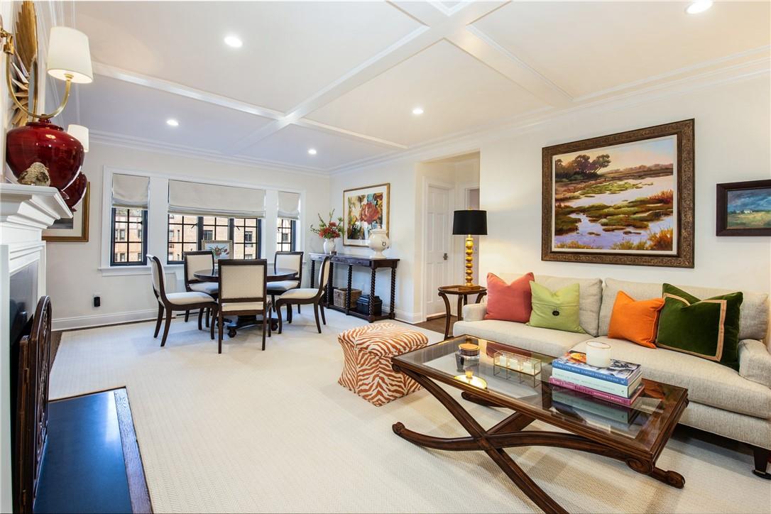 Spacious Living Room/Dining Room combination with fireplace offers that open floor plan we all crave. Entertain with ease with great circular flow and good floor space ,  room for a table that can seat 6-8 !