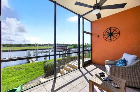 a view of a balcony with furniture