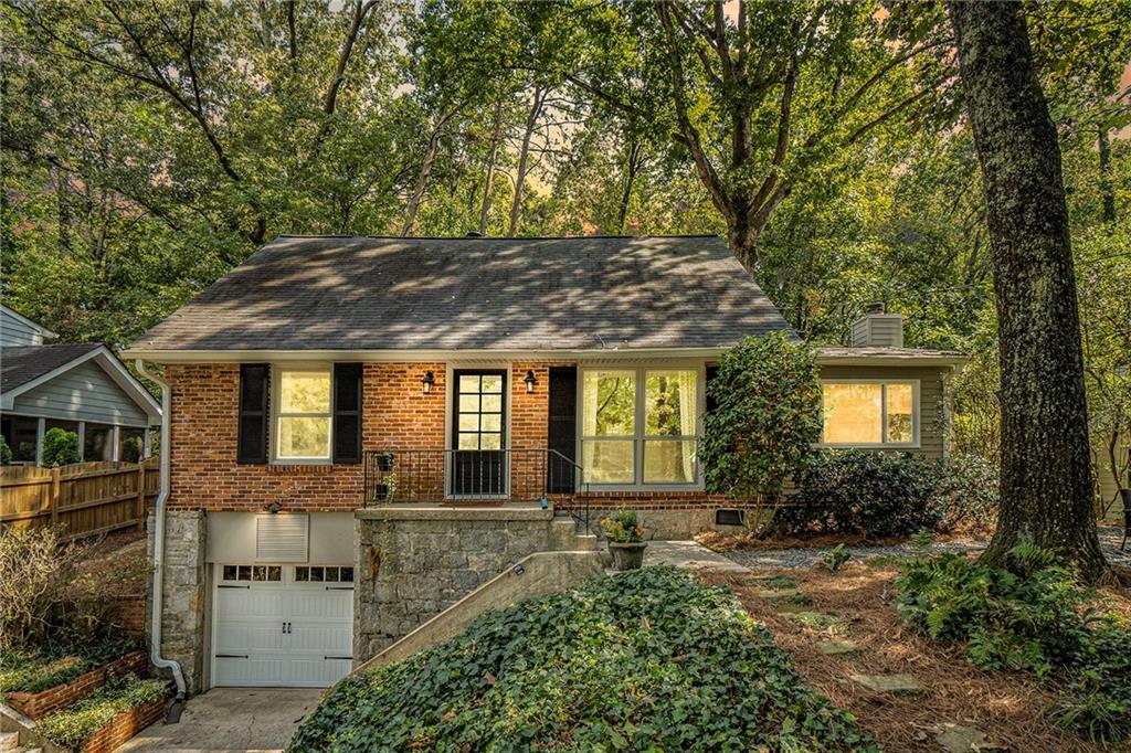 2721 Ridgemore Road Northwest Atlanta, GA 30318 - Photo 1 of 1 front view of a house with a yard