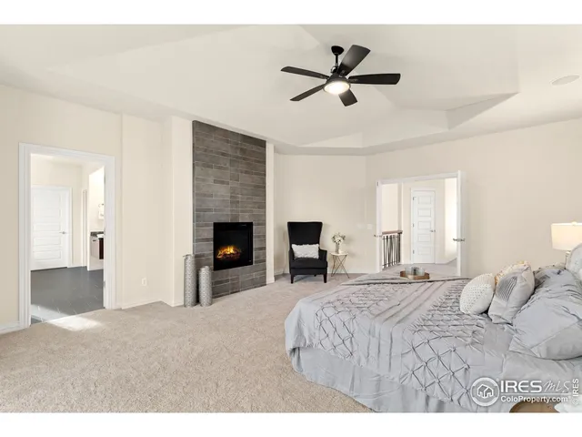 a large bathroom with a double vanity sink large mirror and a bathtub