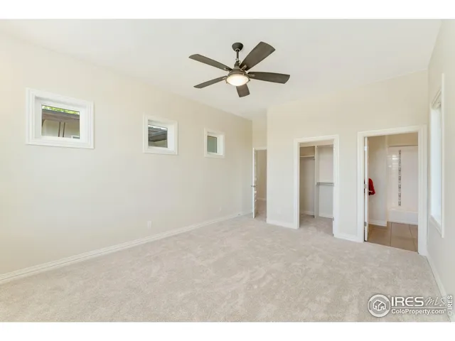 a bathroom with a bath tub sink vanity and mirror