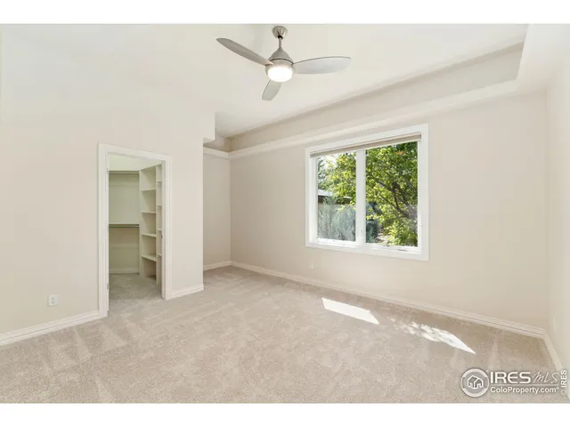 a view of a kitchen with a sink and cabinets