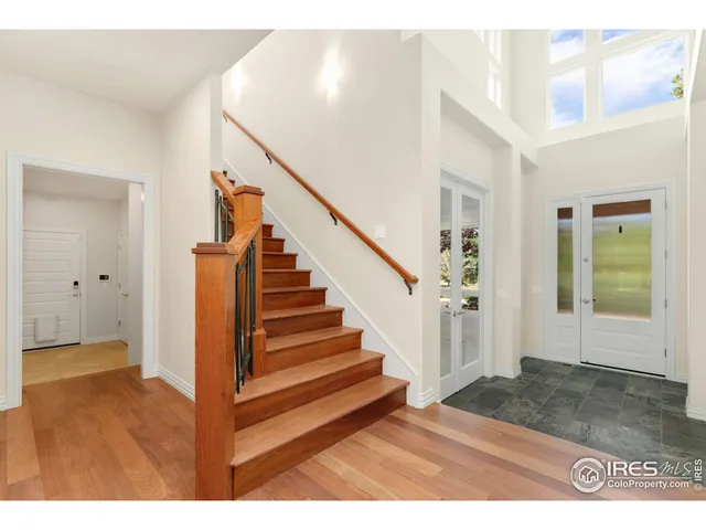 a view of entryway with wooden floor