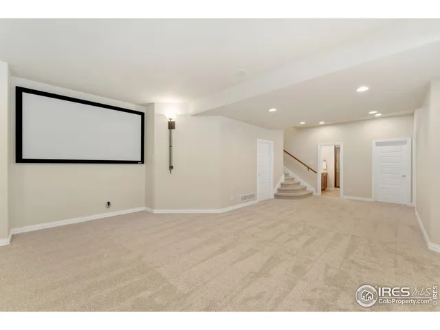 a bathroom with a sink double vanity and a mirror