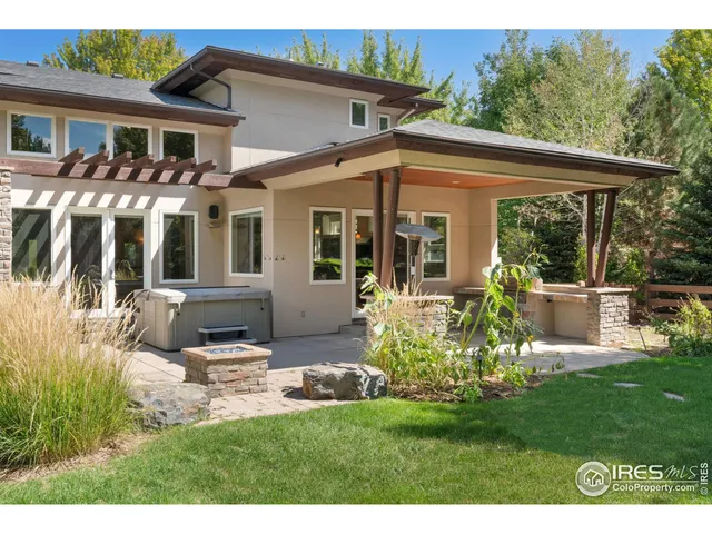 a open kitchen with a table and chairs