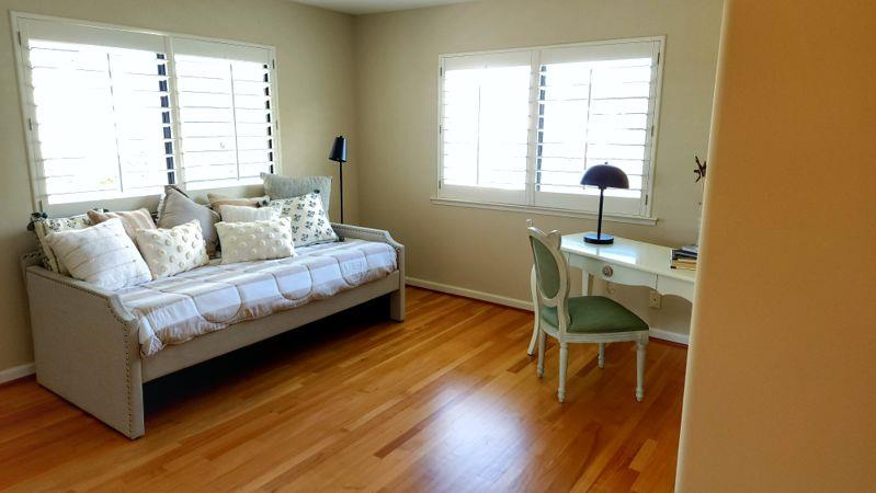 3850 Rio Road, Unit 57 Carmel, CA 93923 - Photo 12 of 25 a living room with furniture and a window