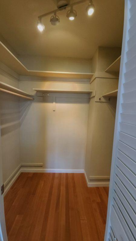 3850 Rio Road, Unit 57 Carmel, CA 93923 - Photo 13 of 25 a view of a room with racks on the wall