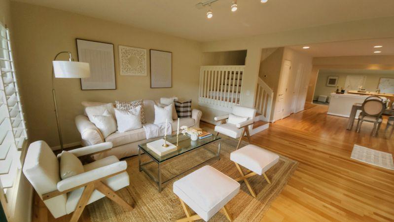 3850 Rio Road, Unit 57 Carmel, CA 93923 - Photo 10 of 25 a living room with furniture and a table