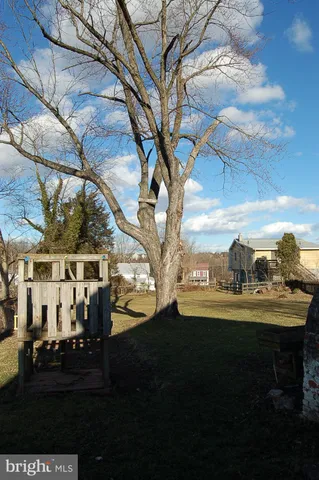 a view of yard with outdoor seating