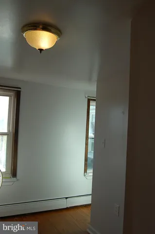 a view of a room with a window