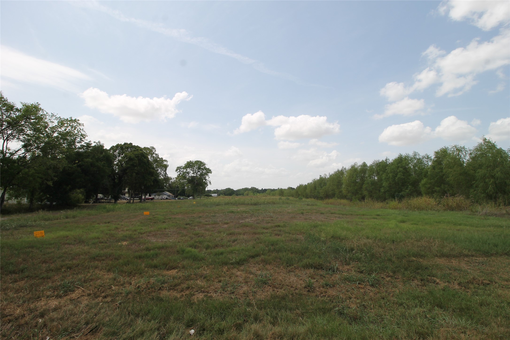 6-10 Washington Street Hempstead, TX 77445 - Photo 6 of 11 a view of grassy field with trees
