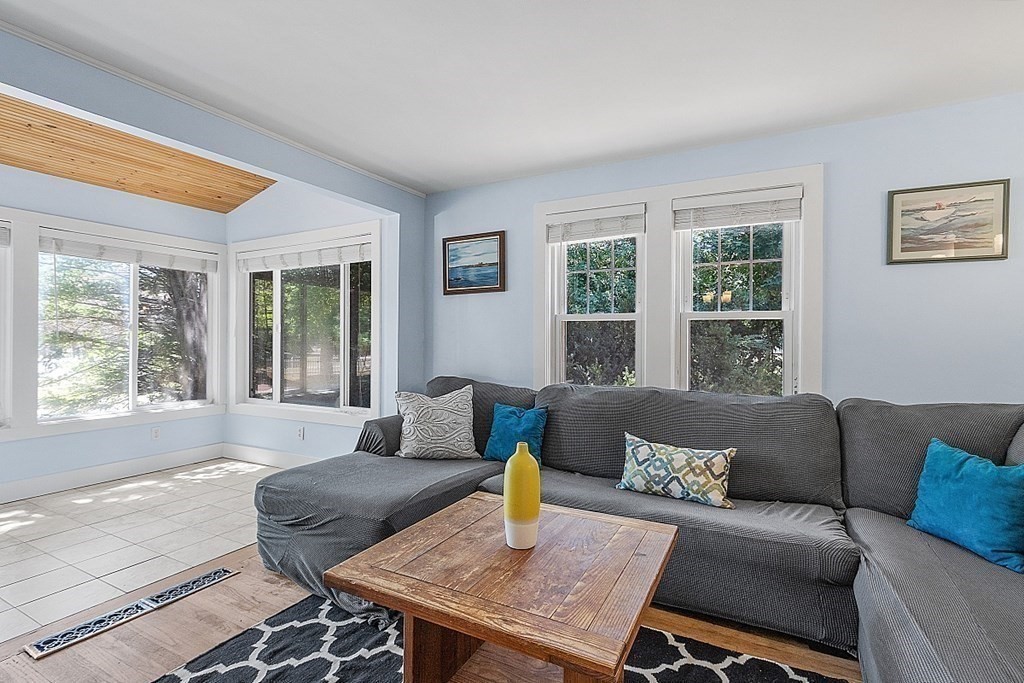 175 Forge Village Road Groton, MA 01450 - Photo 11 of 26 a living room with furniture and a window