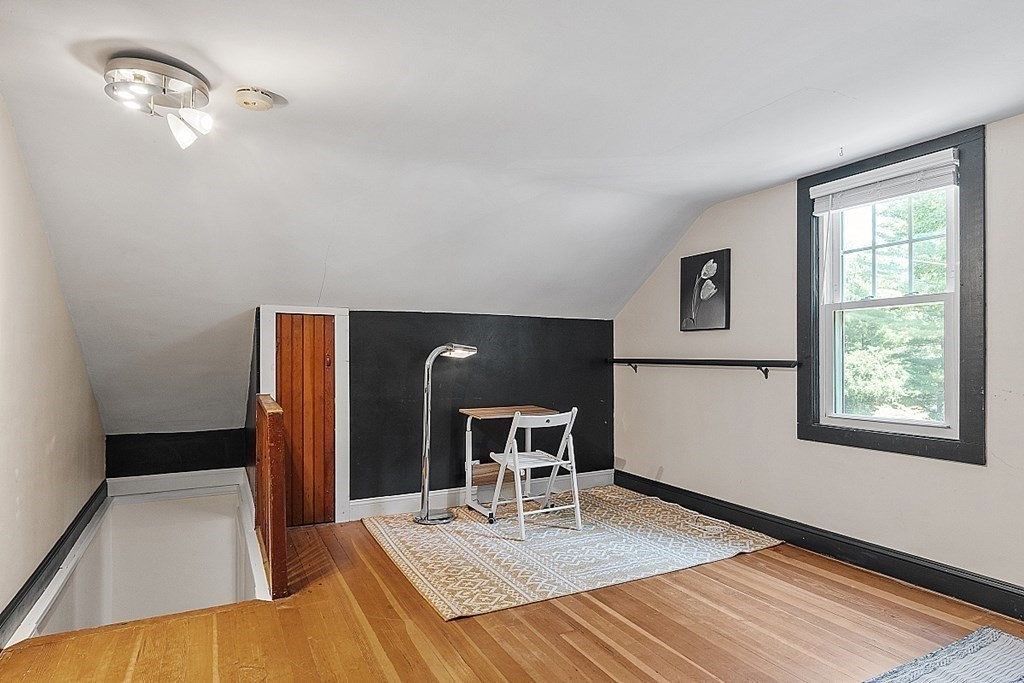 175 Forge Village Road Groton, MA 01450 - Photo 21 of 26 a view of a livingroom with furniture and window