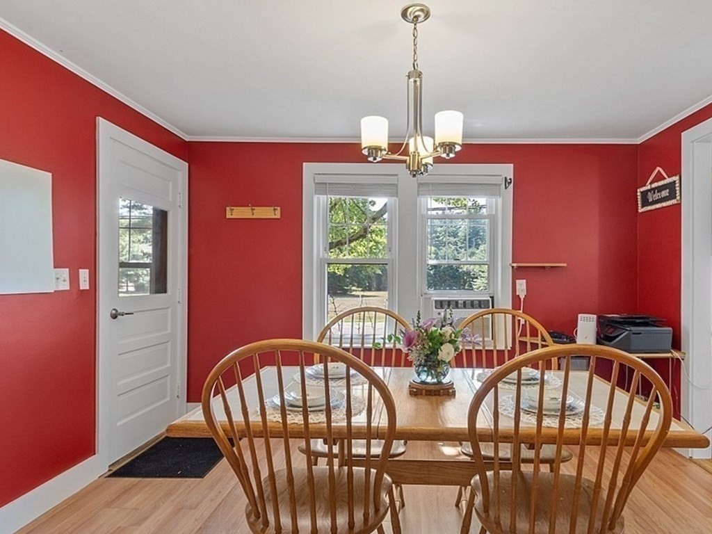 175 Forge Village Road Groton, MA 01450 - Photo 5 of 26 a view of a dining room with furniture window and outside view