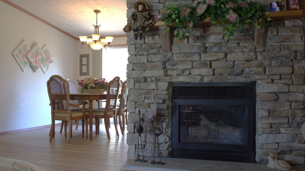20 Deer Run Brookfield, MA 01506 - Photo 9 of 29 a view of a dining room with furniture and chandelier