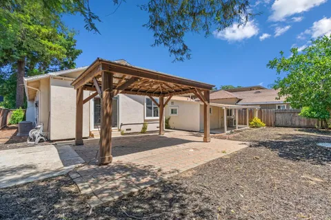 a view of a house with a patio