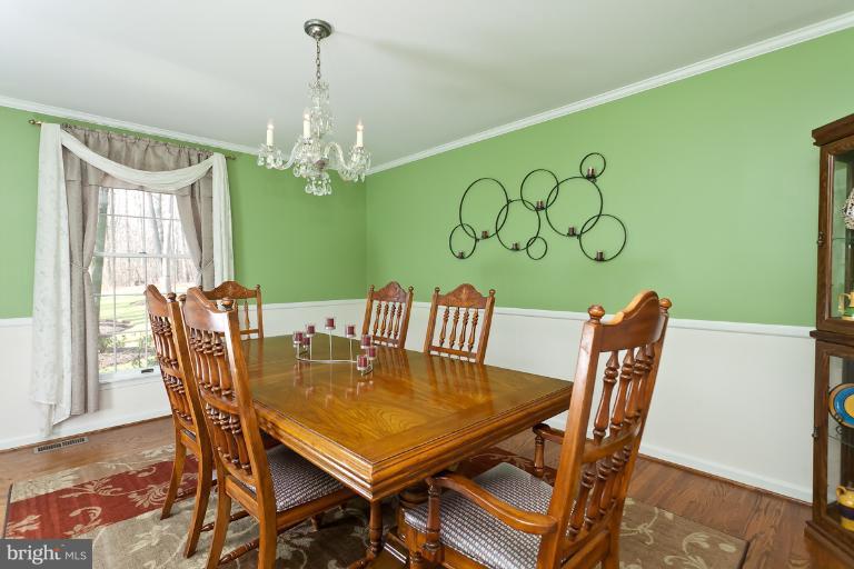 2003 Pine Pep Road Reisterstown, MD 21136 - Photo 6 of 30 Dining Room w/ Chair rail and crown molding