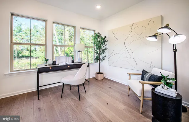 a room with furniture and a window