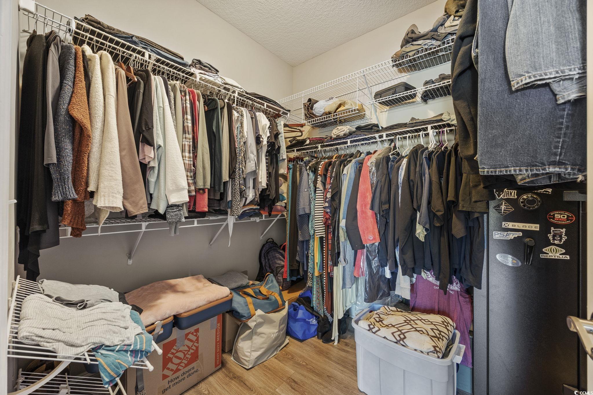 418 Cabo Loop Myrtle Beach, SC 29588 - Photo 16 of 40 Walk in closet with light wood finished floors