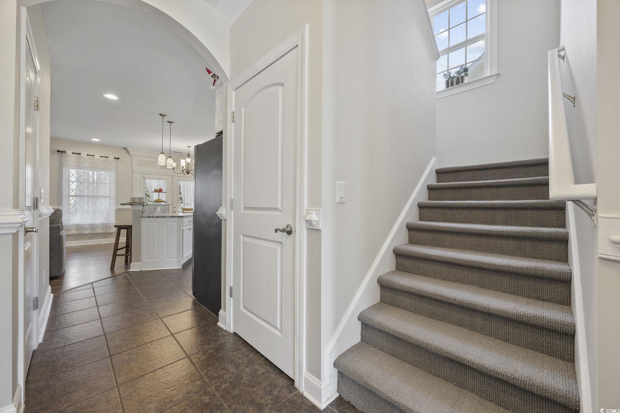 418 Cabo Loop Myrtle Beach, SC 29588 - Photo 21 of 40 Staircase with recessed lighting and a chandelier