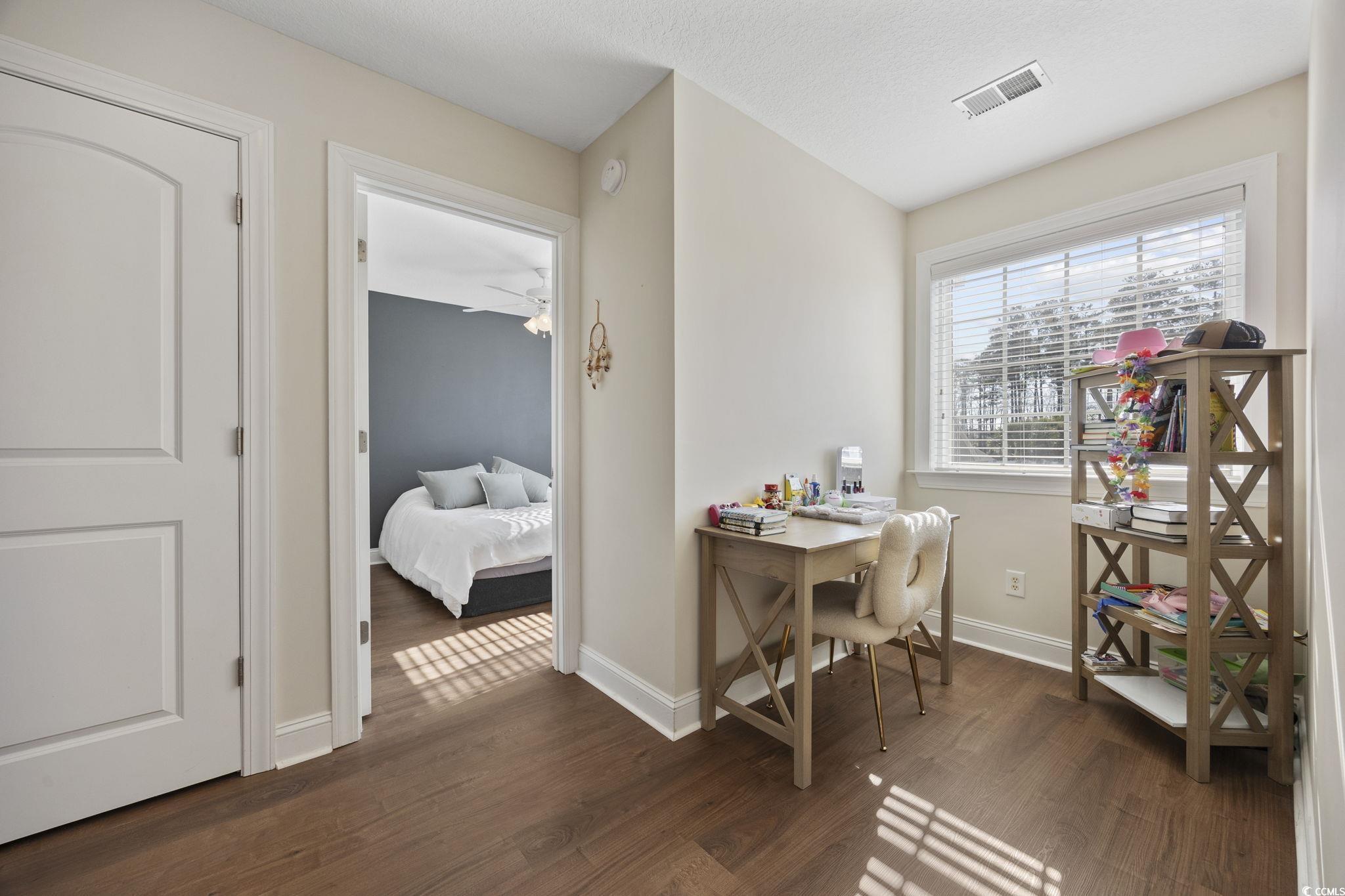 418 Cabo Loop Myrtle Beach, SC 29588 - Photo 27 of 40 Office space featuring baseboards and dark wood-type flooring