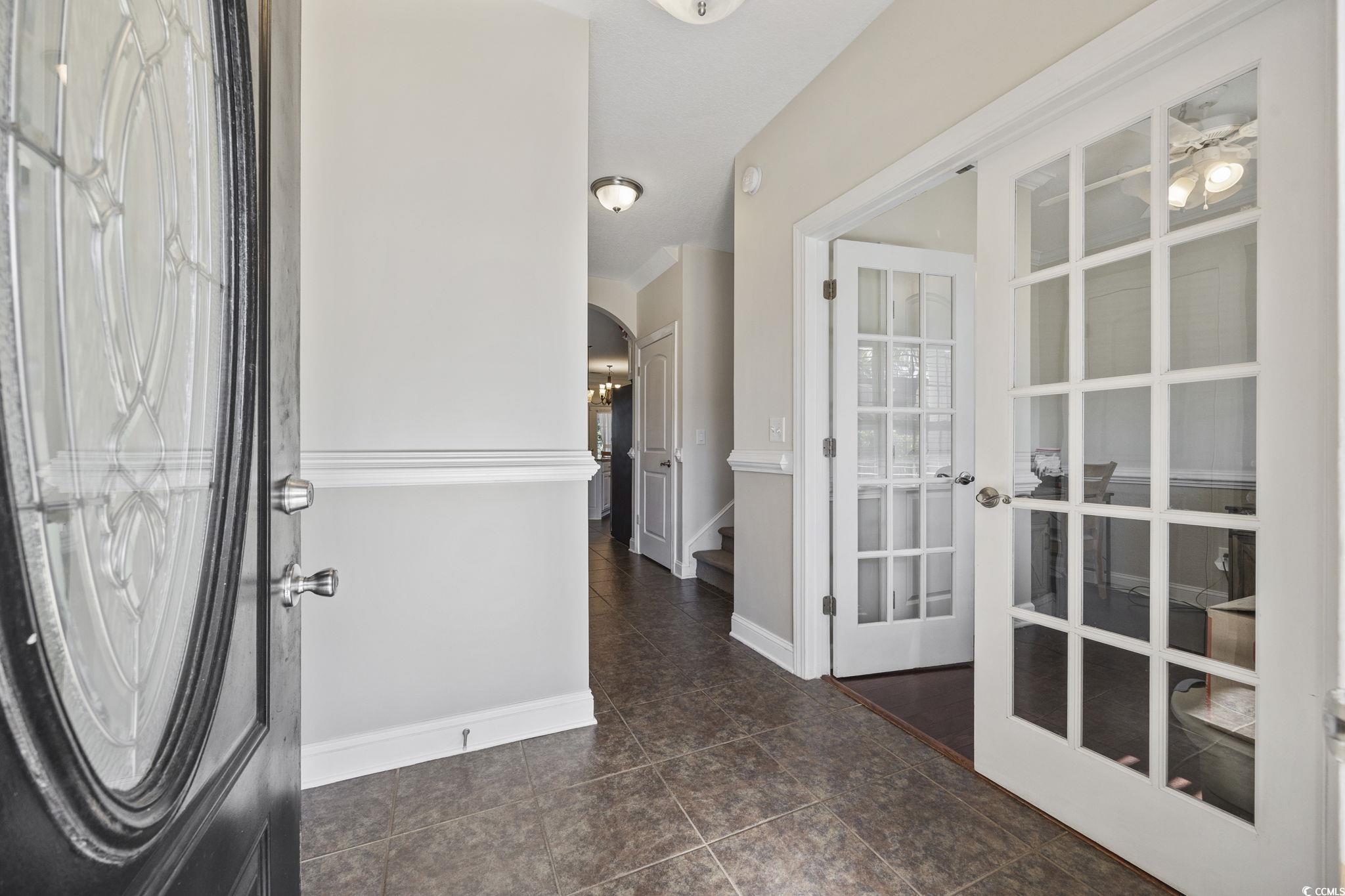 418 Cabo Loop Myrtle Beach, SC 29588 - Photo 3 of 40 Entrance foyer with arched walkways and baseboards
