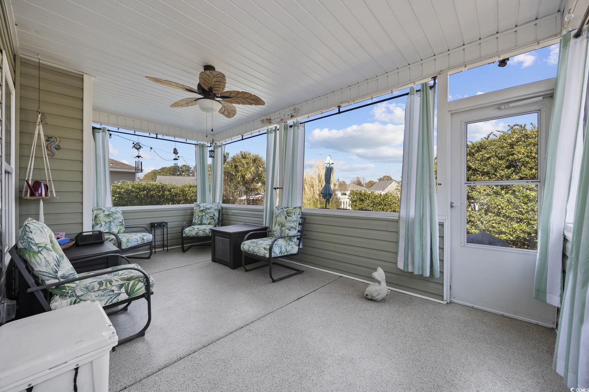 418 Cabo Loop Myrtle Beach, SC 29588 - Photo 31 of 40 Sunroom featuring a ceiling fan