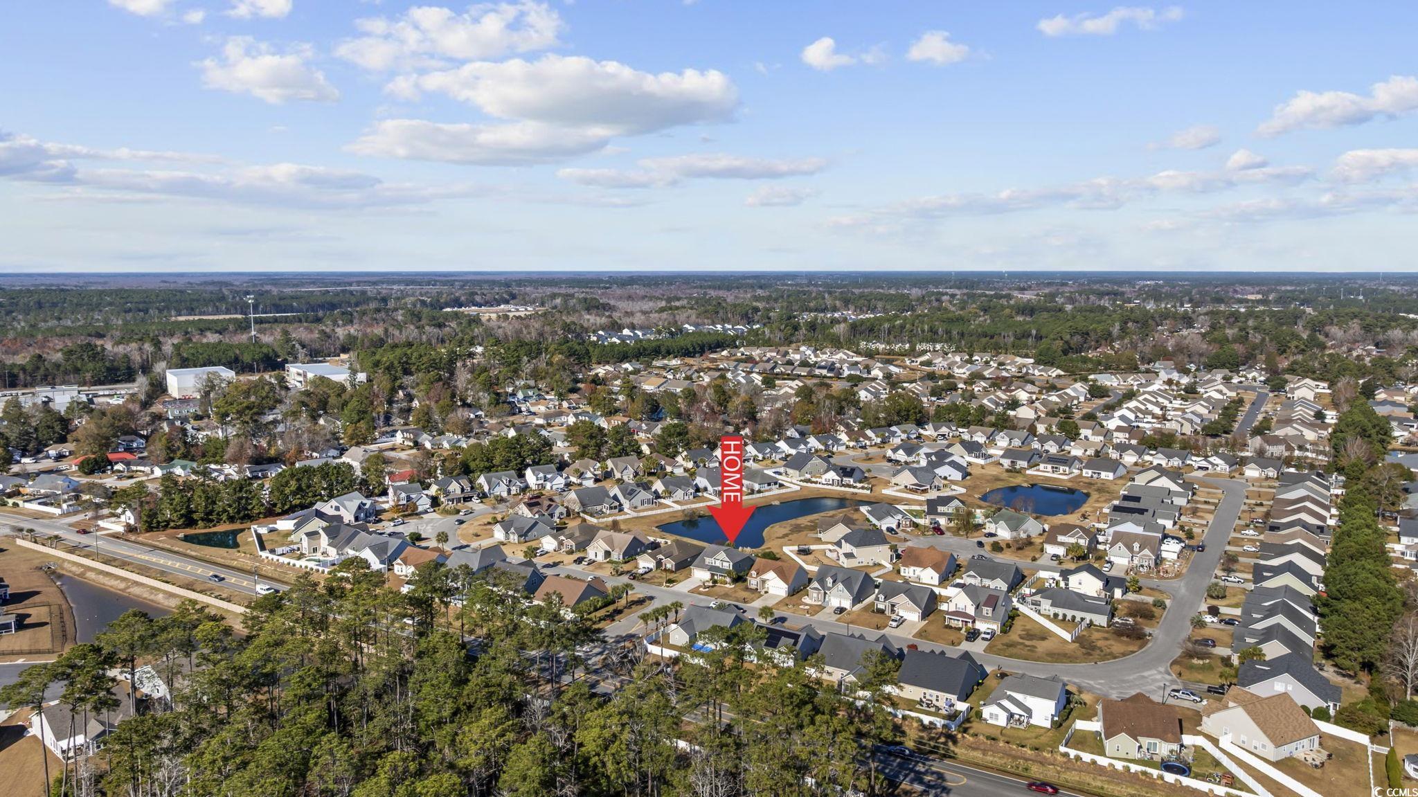 418 Cabo Loop Myrtle Beach, SC 29588 - Photo 38 of 40 Aerial overview of property's location featuring nearby suburban area and a large body of water