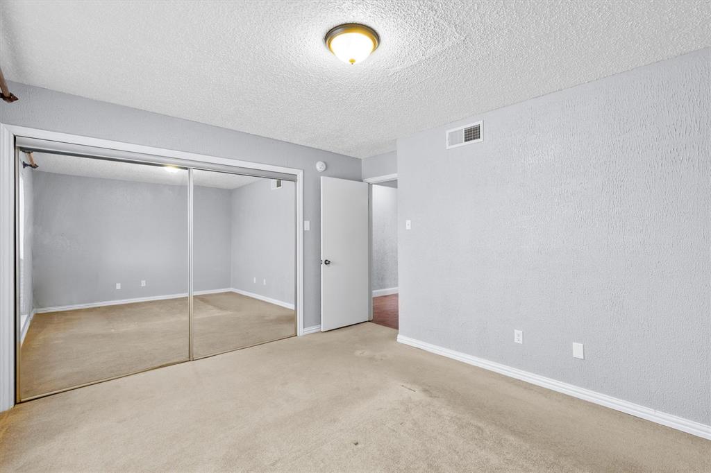 5840 Spring Valley Road, Unit 912 Dallas, TX 75254 - Photo 22 of 33 a view of an empty room