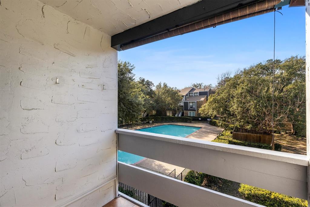 5840 Spring Valley Road, Unit 912 Dallas, TX 75254 - Photo 29 of 33 a view of a balcony with an outdoor space